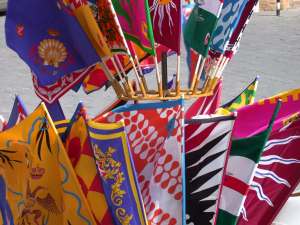 Banners are sold as souvenirs at modern palios.